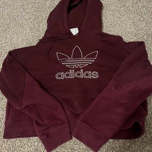 Size small Maroon adidas cropped sweatshirt with a small stain on the front